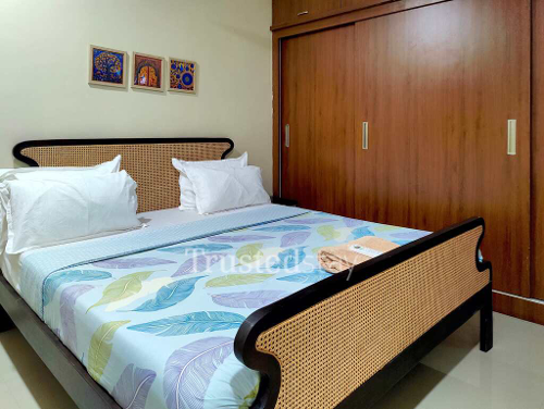 Bedroom one of TS No 17/1 TrustedStay Service Apartment in Banjara Hills Hyderabad
